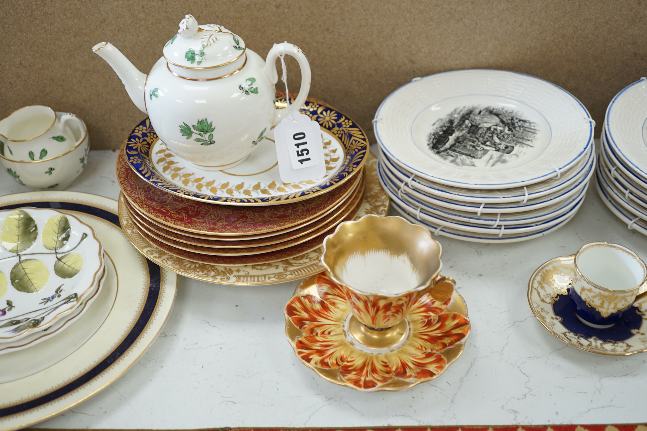 A Spode ‘tulip’ cup and saucer, a set of Sarreguemines month plates and collection of Worcester